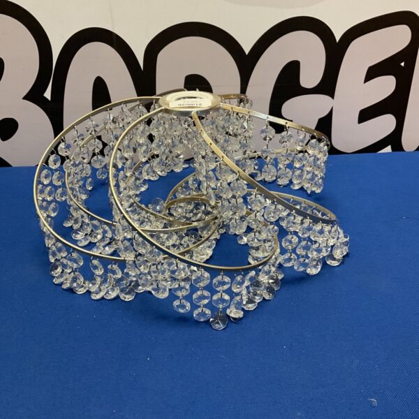 Clear crystal strands from a vintage chandelier component.