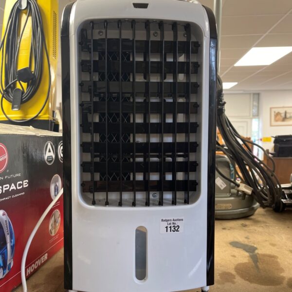White Daewoo air cooler with front grille for portable cooling.