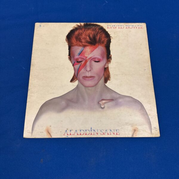 David Bowie Aladdin Sane vinyl record cover, iconic lightning bolt makeup.
