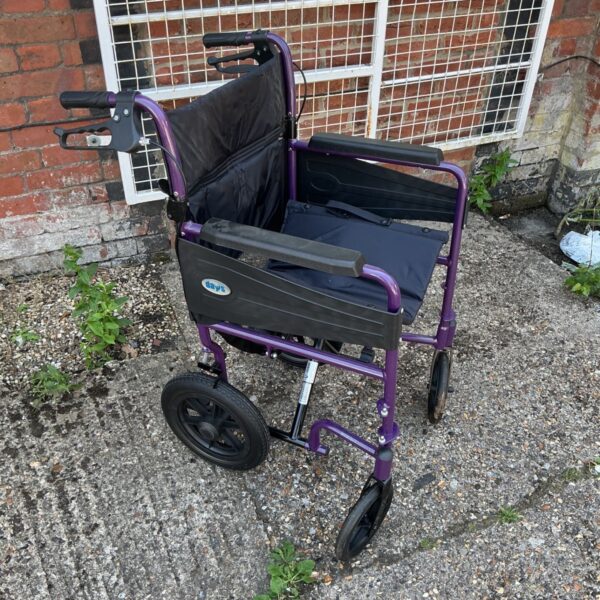 Purple Days folding wheelchair, a lightweight mobility aid.