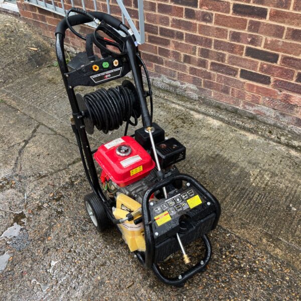 Red and black Dealourus 8.0HP petrol pressure washer for garden cleaning.