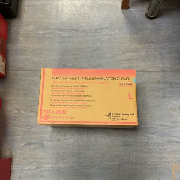 Box of unopened DEHP 97-9606 powder-free blue nitrile examination gloves.