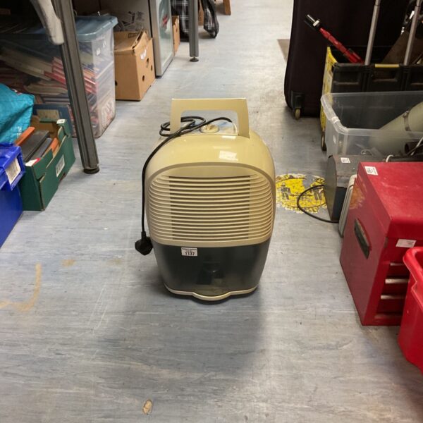 White De’longhi DEM10 dehumidifier for removing moisture from the air.