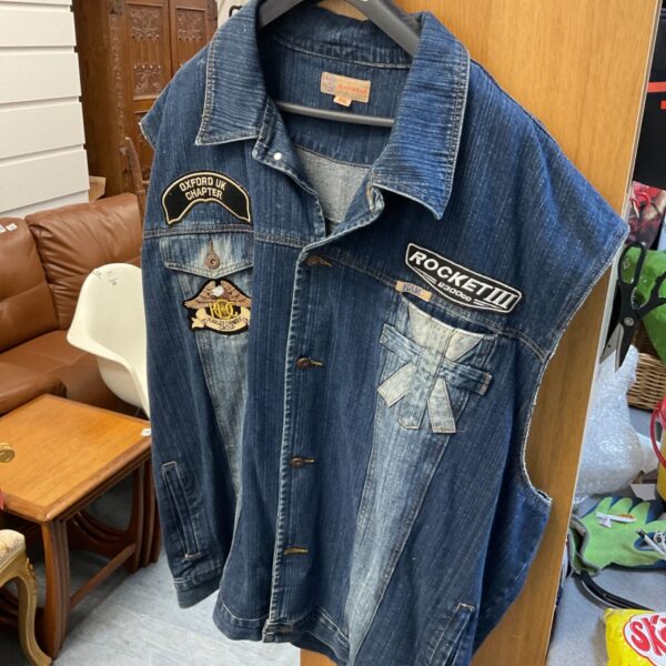 Blue denim vest with patches, size 6XL.