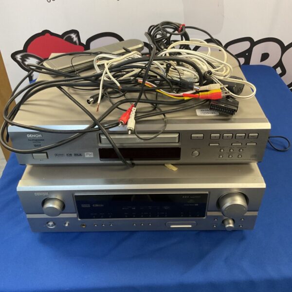 Black Denon DVD player with connections and radio selector.