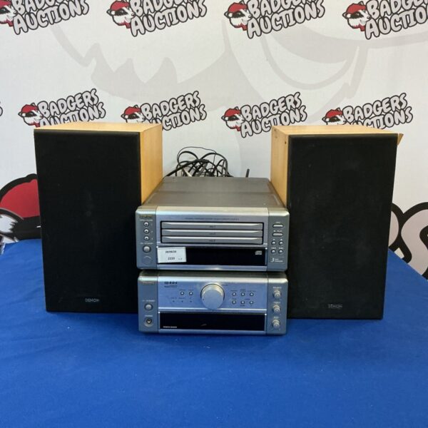 Vintage Denon stereo system with CD changer, amplifier, and speakers.