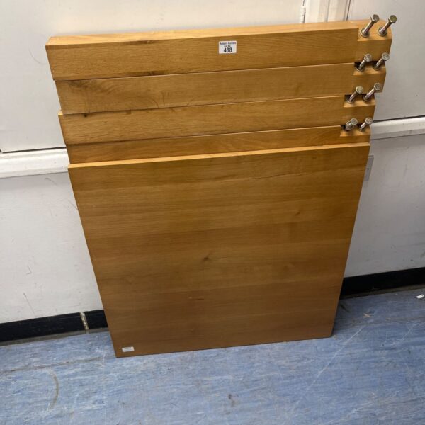 Vintage detachable leg table with screw-on legs.