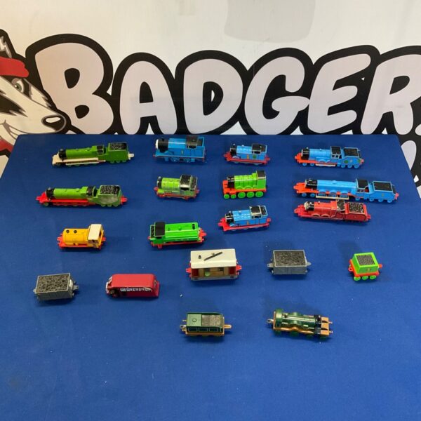 Diecast Thomas the Tank Engine models in a collectible lot.