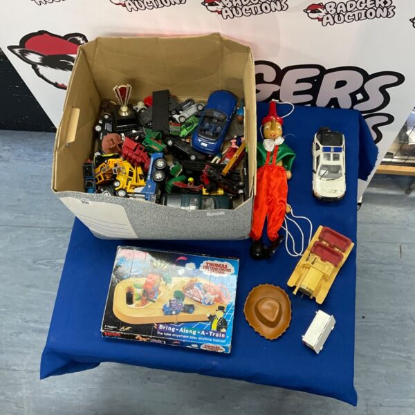 Assorted diecast toy cars and Tomy Thomas the Tank Engine train lot.