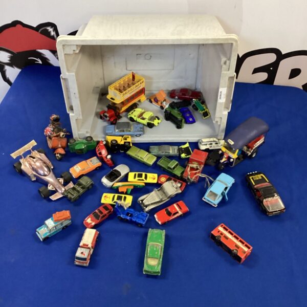 Large lot of vintage diecast vehicles and toy cars.