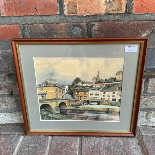 Don Goldie watercolour painting of a river town with a church.