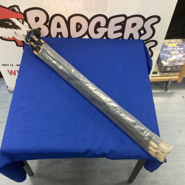 Set of used drain rods for clearing blocked drains.