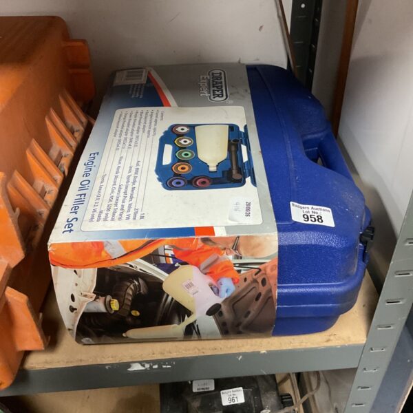 Blue Draper engine oil filler set with carrying handle.