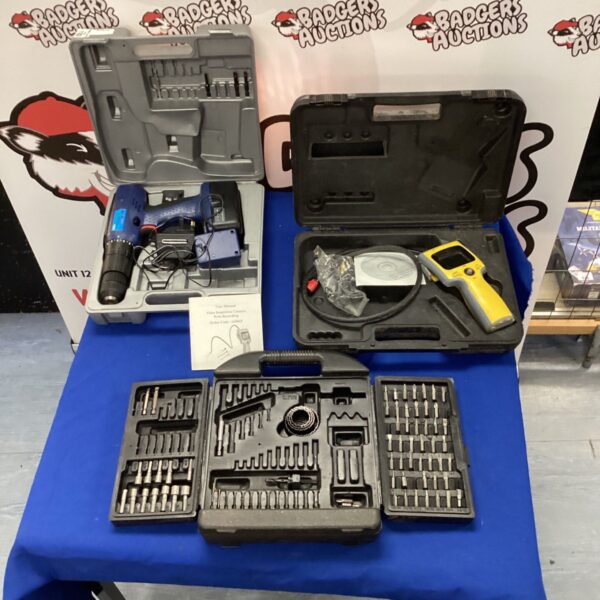 Drill and inspection camera kit with drill bits in a case.