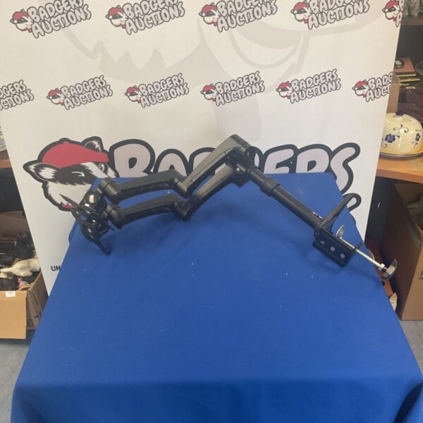Used dual monitor arm stand for desk mounting.
