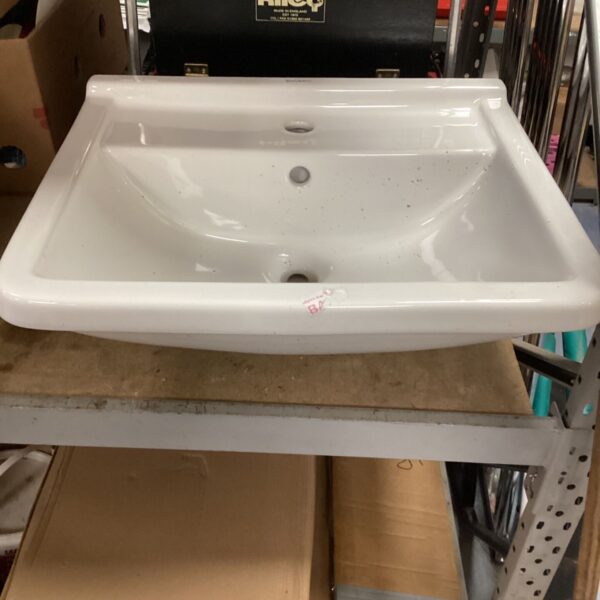 White ceramic Duravit sink for bathroom renovation or collection.