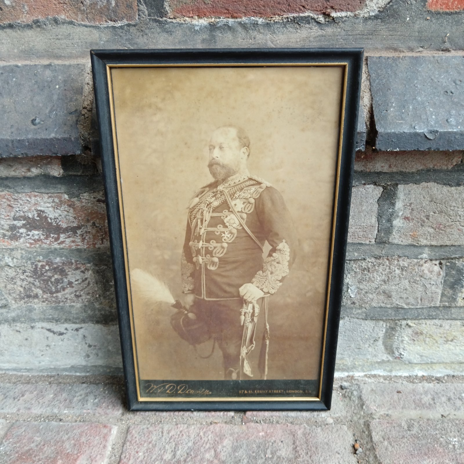 Antique black and white photograph of King Edward VII in military uniform.