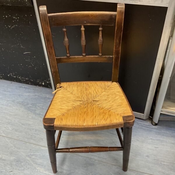 Antique Edwardian rush seat child’s chair with woven seat.