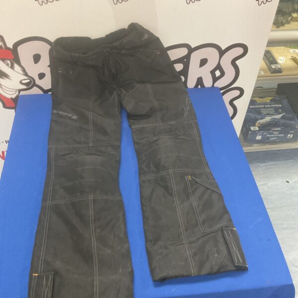 Dark grey women's Exon Angelic workwear trousers with padded knees.