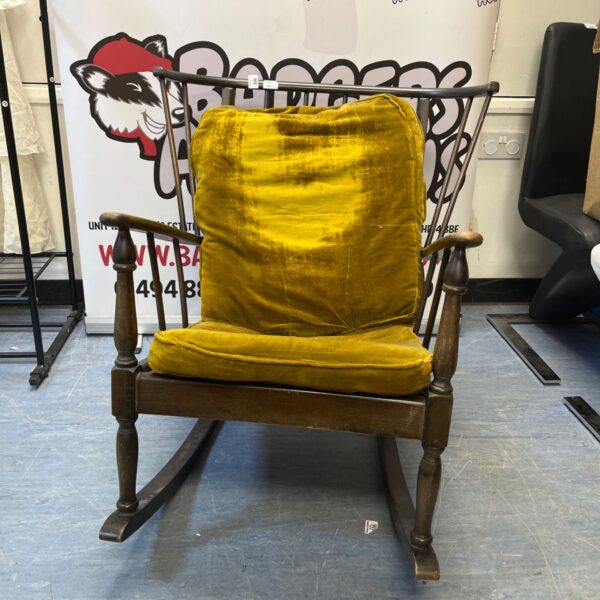 Vibrant yellow Farstrup rocking chair with dark wooden frame.