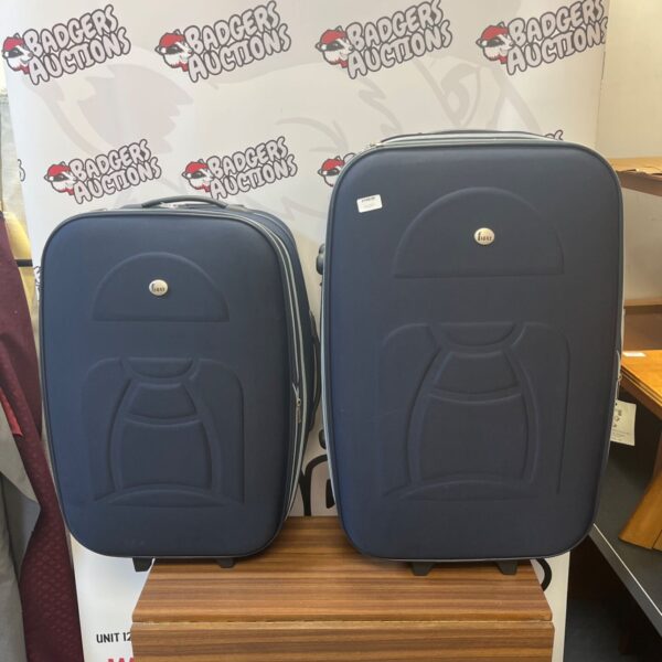 Navy blue Fiore suitcases, vintage hard shell luggage set.