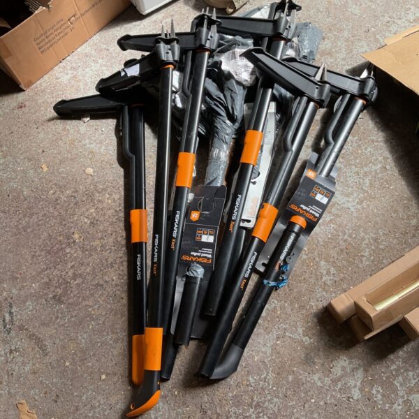 Job lot of Fiskars weed pullers for garden maintenance.