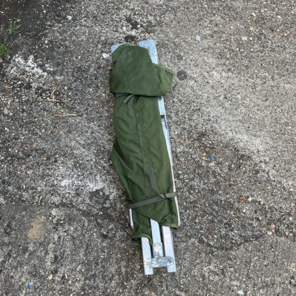 Vintage folding army camp bed in used condition.