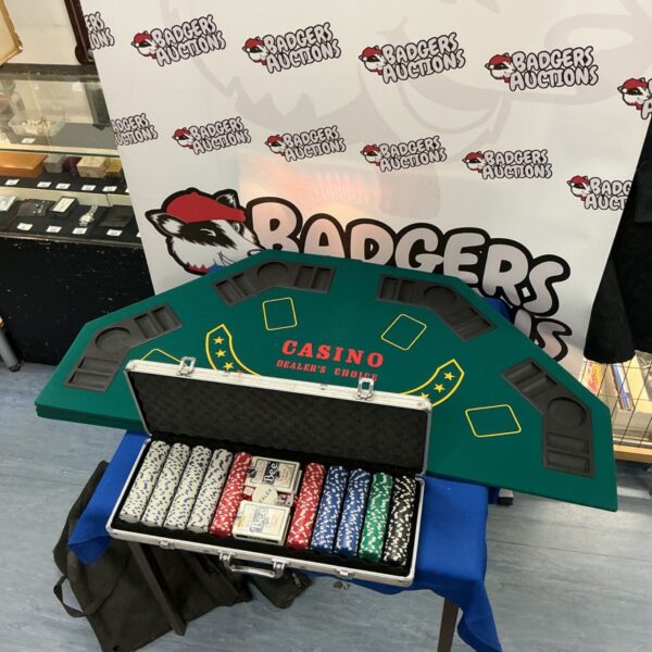 Folding poker table with poker chips inside the carrying case.