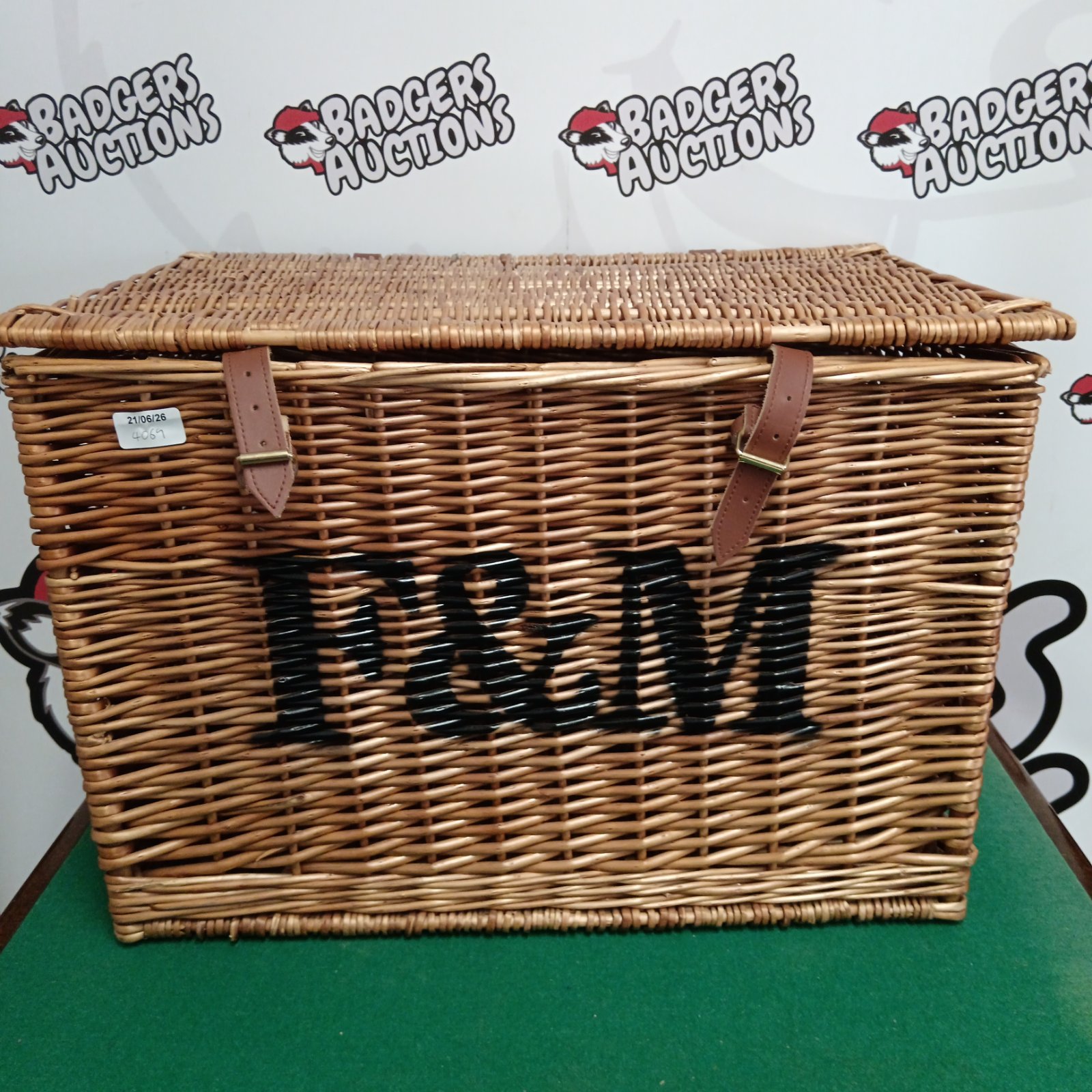 Large Fortnum and Mason wicker hamper basket with handles.