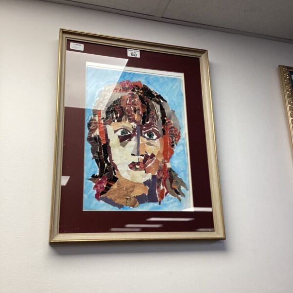 Framed collage portrait of a face, unique mixed media artwork.