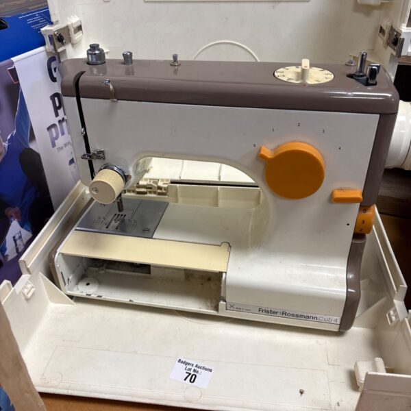 Vintage Frister Rossmann Cub 4 sewing machine in carrying case.