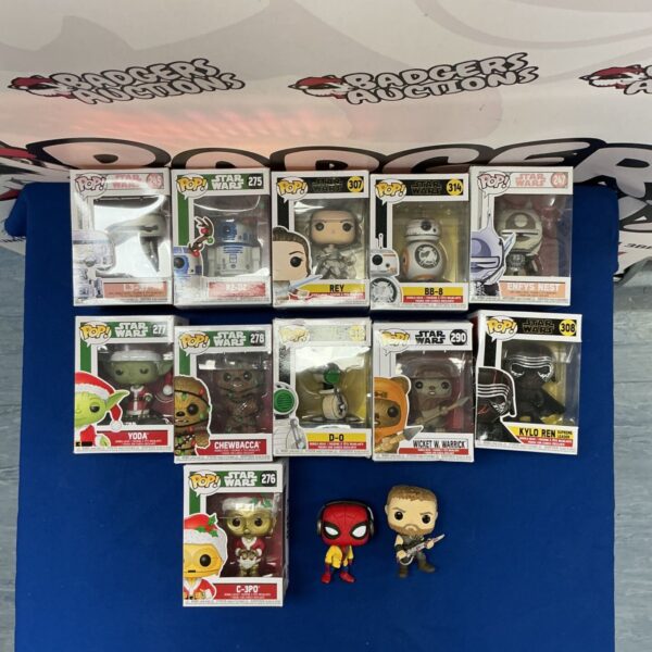 Funko Pop Star Wars collection featuring Yoda, Chewbacca, and Kylo Ren bobbleheads.