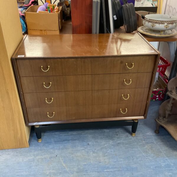 Vintage G Plan chest of drawers with four drawers and a warm wood finish.