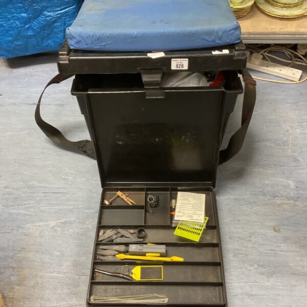 Open Galaxy fishing tackle box with seat and fishing gear inside.