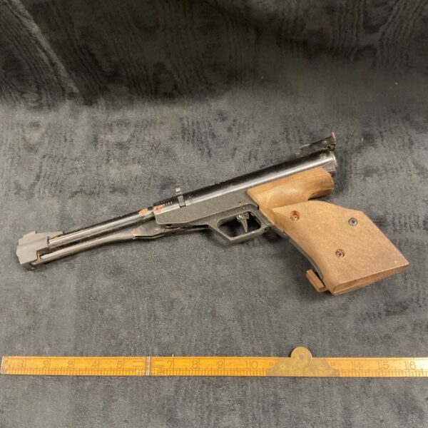 Vintage Gamo target pistol in side profile.