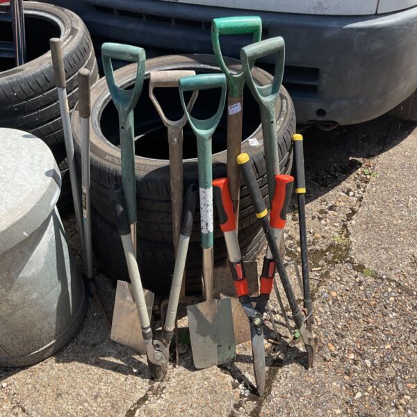 Job lot of stainless steel garden tools including spades and forks.