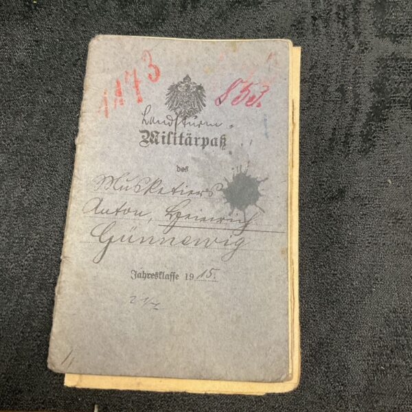 German WWI Soldatenpass cover with imperial eagle emblem.