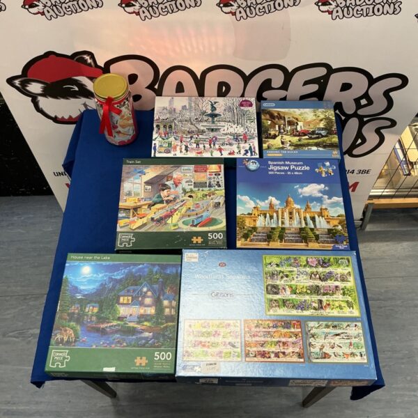 Gibsons Corner Piece jigsaw puzzle lot with other puzzles visible.