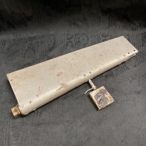 WWII Gloster Meteor aileron trim tab showing wear and corrosion.