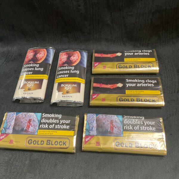 Sealed packs of Gold Block and Borkum Riff pipe tobacco for collectors.