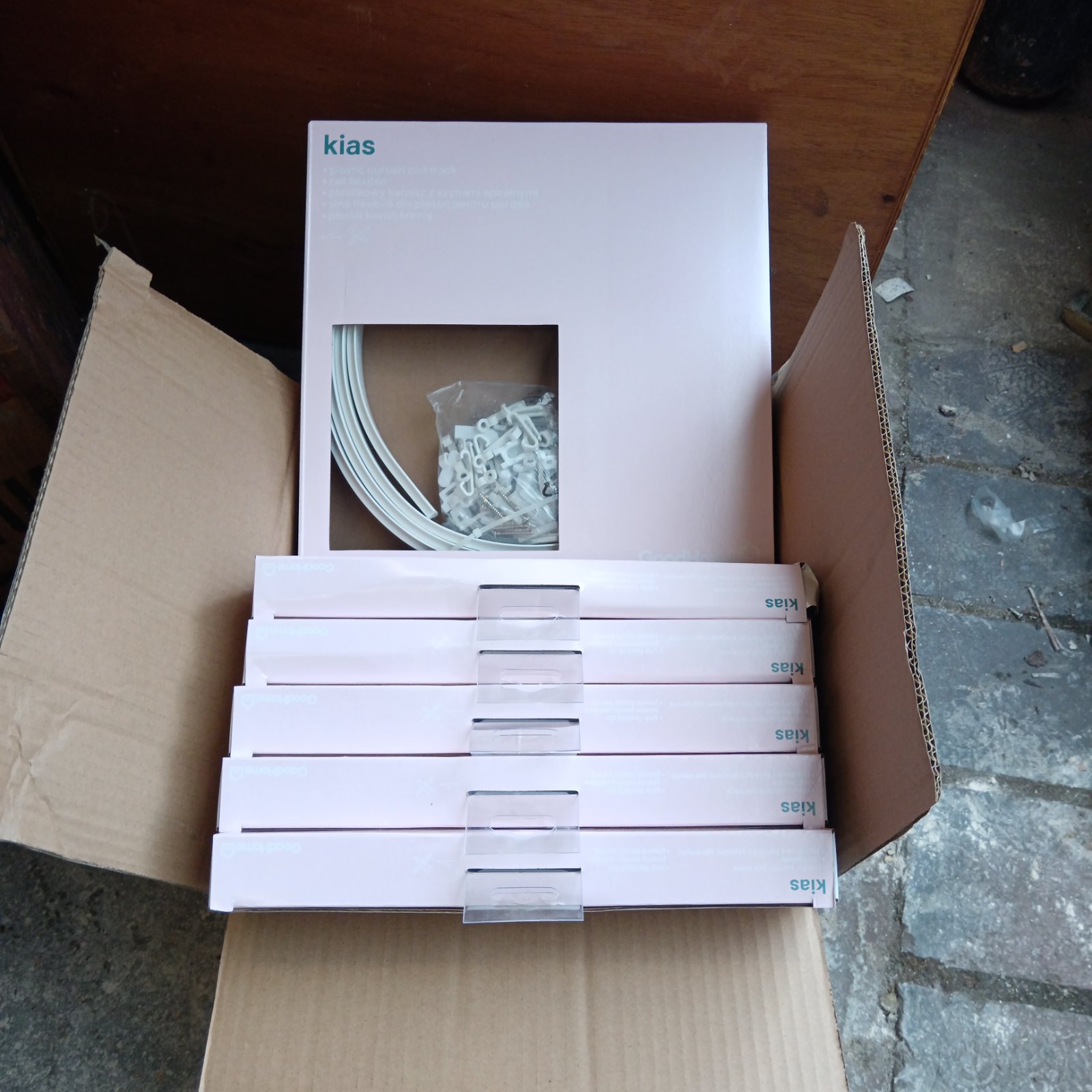 Box of six packs of Goodhome Kias plastic curtain coil tracks for windows.