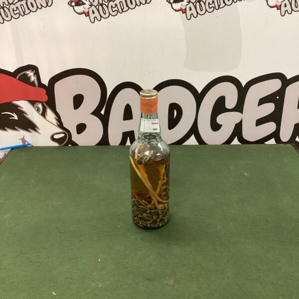 Habushu snake wine bottle with preserved snake inside.