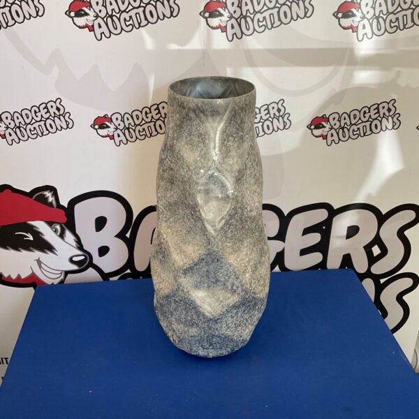 Tall hammered metal vase for modern home decor.