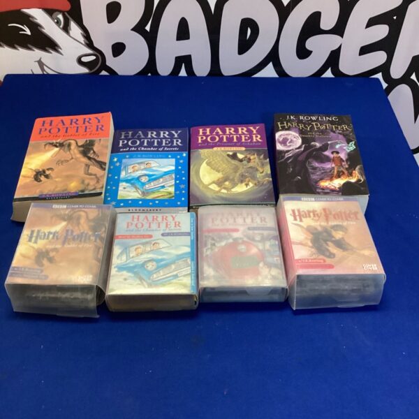 Lot of Harry Potter books and VHS tapes for collectors.