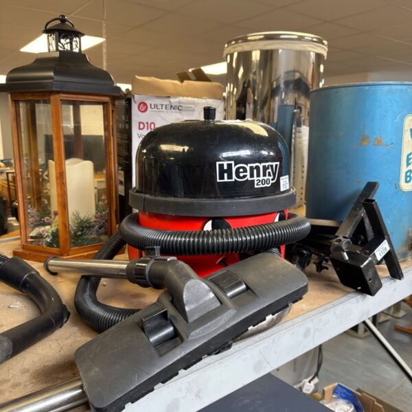 Red Henry 200 vacuum cleaner, a classic cleaning appliance.