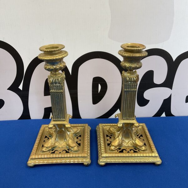 Antique gilded bronze candlesticks with dolphin feet by Henry Picard.