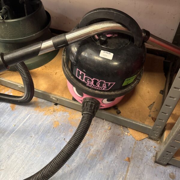 Hetty Xtend industrial vacuum cleaner with flexible hose.