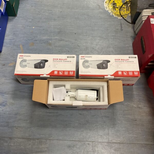 Three boxes of Hikvision EXIR bullet network cameras for security surveillance.