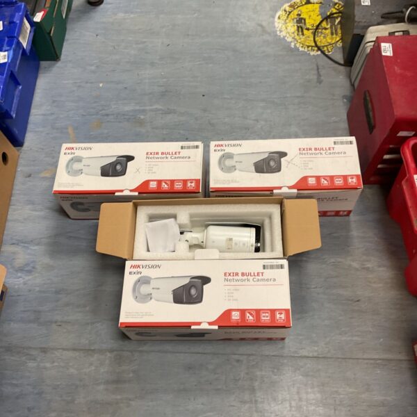 Four boxes of Hikvision EXIR bullet network cameras for security surveillance.