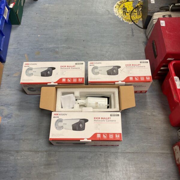 Four boxes of Hikvision EXIR bullet network cameras for security surveillance.